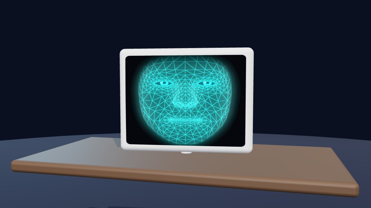 A monitor on a desk showing Wireface's glowing cyan hologram face
